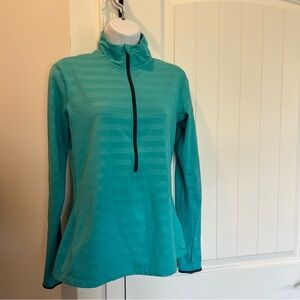 Nike Teal Long Sleeve 1/2 zip pullover for running with thumb holes striped